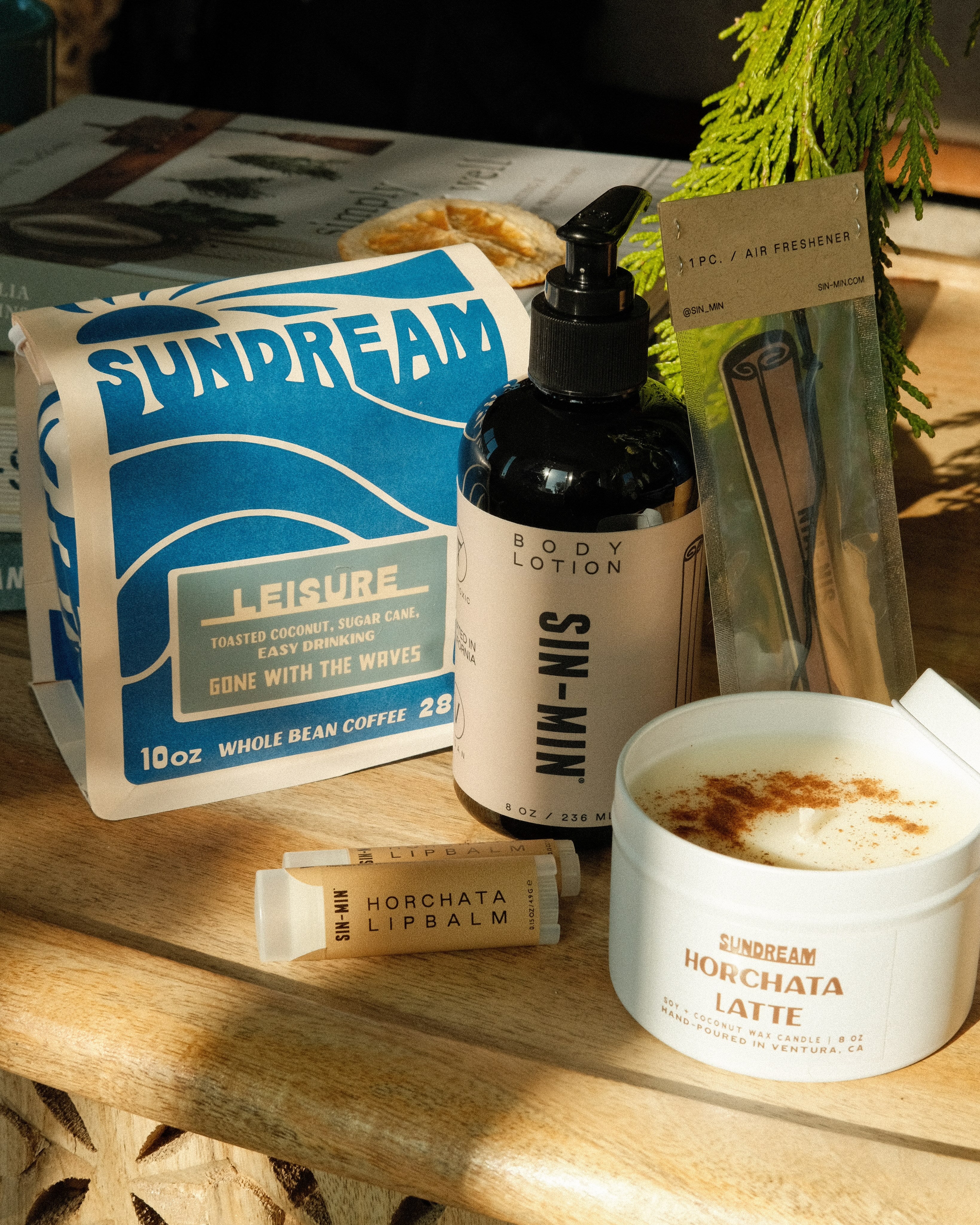 The Sundream and SIN-MIN Gift Set with coffee, lip balms, candle, air freshener and body lotion
