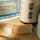 The Sundream and SIN-MIN Gift Set with lip balms, body lotion, and coffee.
