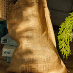The Sundream and SIN-MIN Gift Set burlap bag.