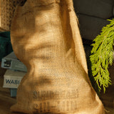 The Sundream and SIN-MIN Gift Set burlap bag.