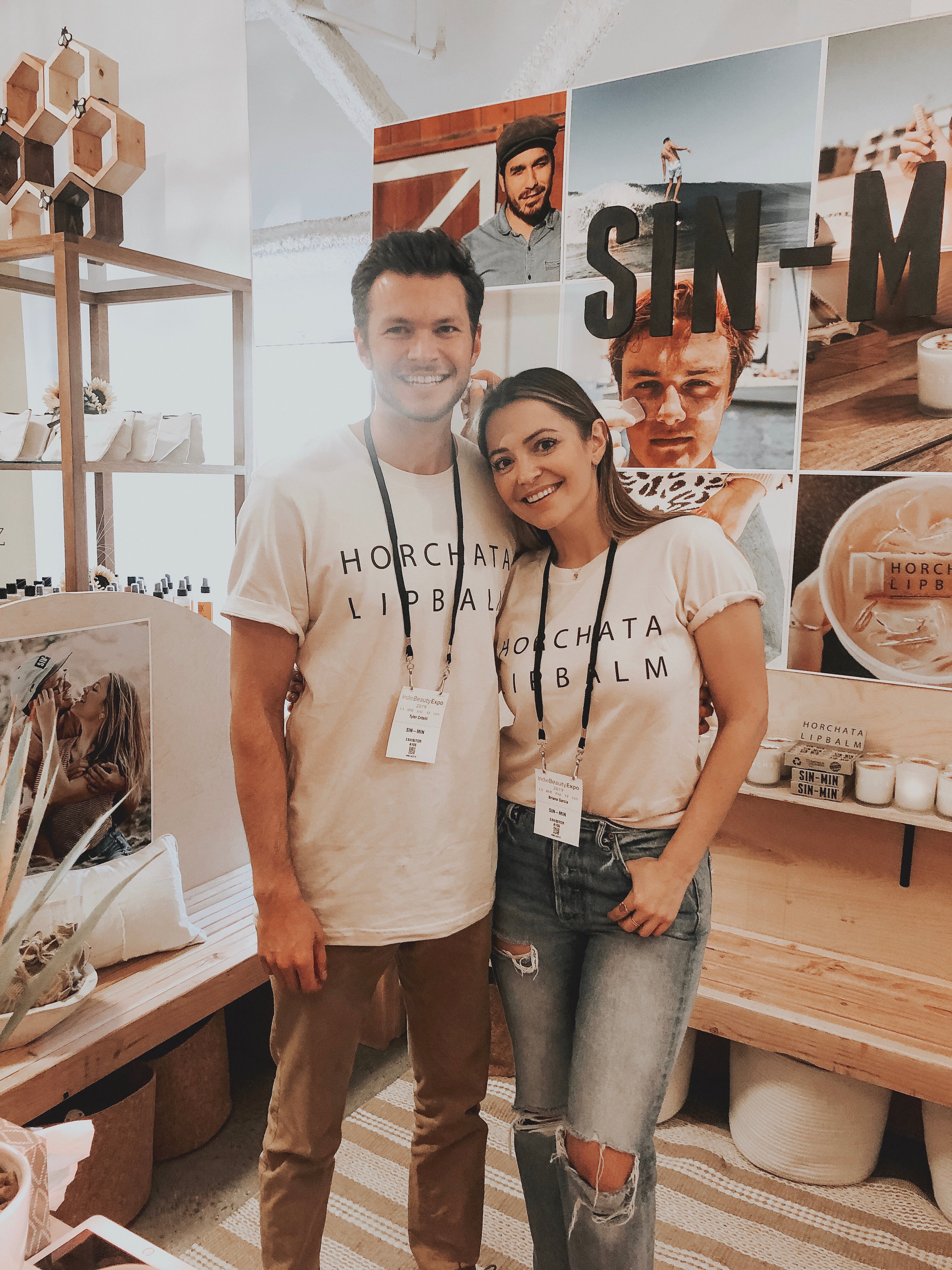 The owners of SIN-MIN at a trade show