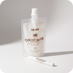 Cocochata body care product packaging on a light background