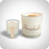 3 oz and 10 oz horchata candles with a light grey background