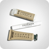 horchata lip balm, cocochata lip balm, and churro lip scrub with a light grey background