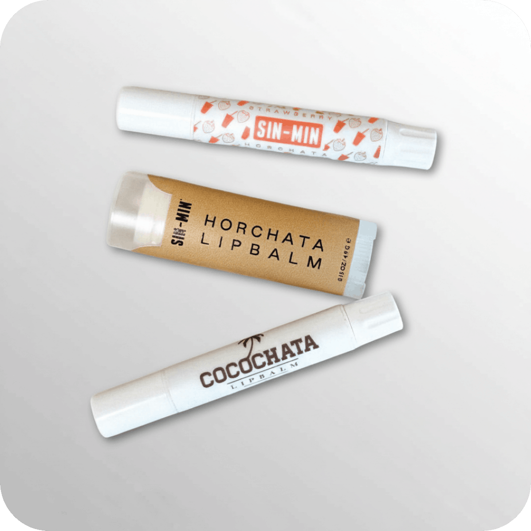 horchata, cocochata, and strawberry horchata lip balms with light grey background
